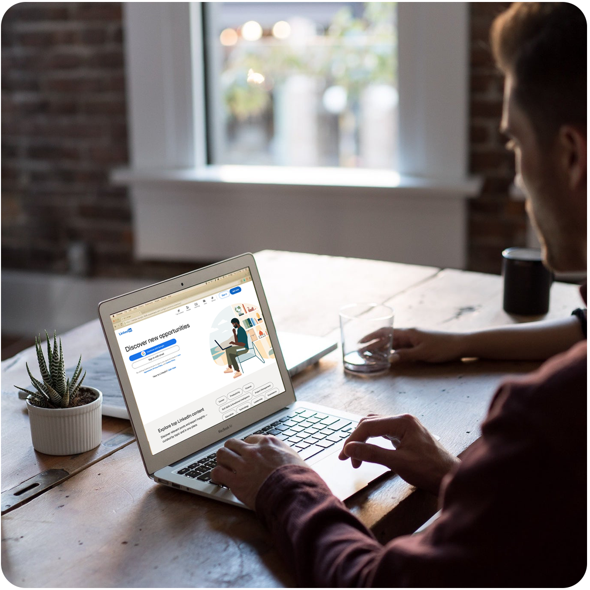 Young professional logging into LinkedIn for account management and marketing strategy